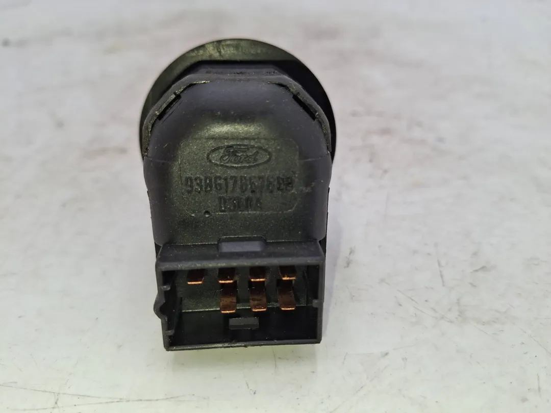 Interruttore regolazione retrovisore esterno Interruttore regolazione retrovisore esterno